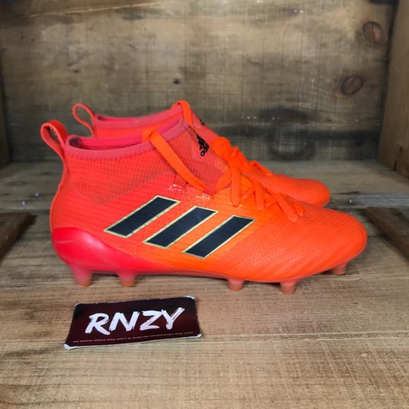 orange adidas cleats